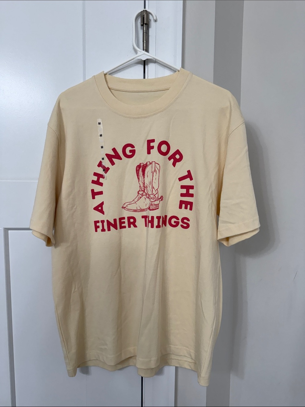 New Graphic Tee 'Aiming for the Finer Things' - Cream with Red Print- size M